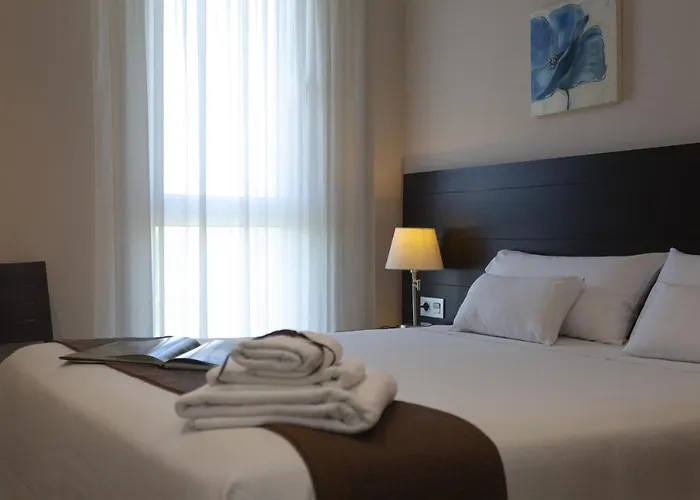 Apartamentos Turisticos Playa De Tapia